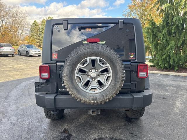 used 2014 Jeep Wrangler Unlimited car, priced at $17,190