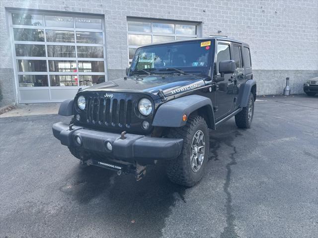 used 2014 Jeep Wrangler Unlimited car, priced at $17,190