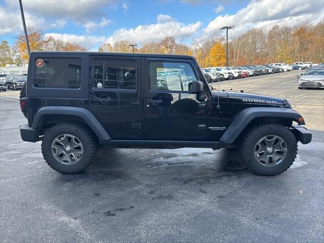 used 2014 Jeep Wrangler Unlimited car, priced at $17,190