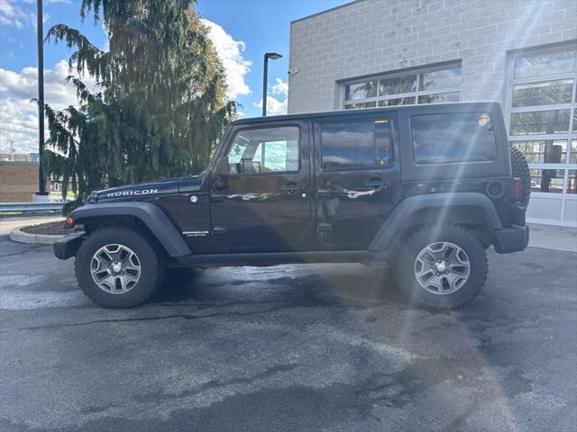 used 2014 Jeep Wrangler Unlimited car, priced at $17,190