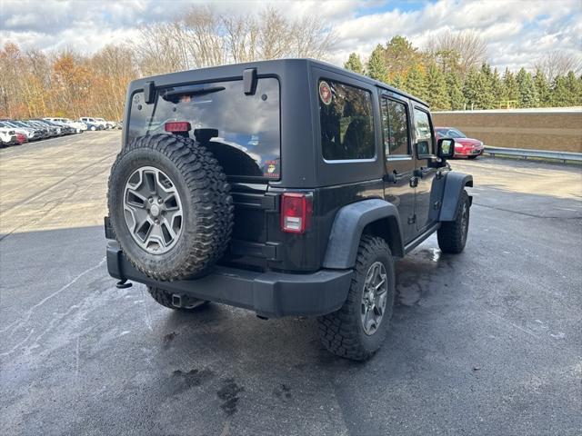 used 2014 Jeep Wrangler Unlimited car, priced at $17,190