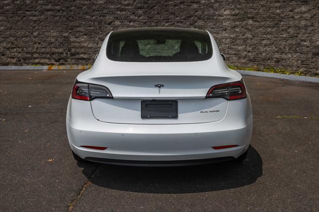 used 2022 Tesla Model 3 car, priced at $19,900