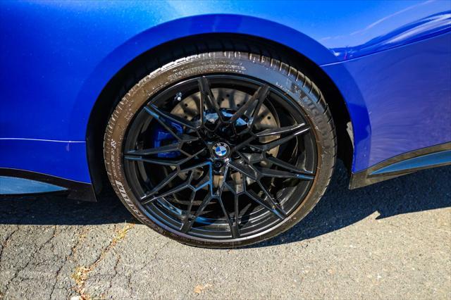 used 2025 BMW M4 car, priced at $95,900