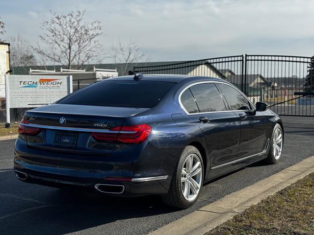used 2016 BMW 750 car, priced at $18,500