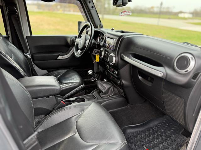 used 2014 Jeep Wrangler Unlimited car, priced at $12,995