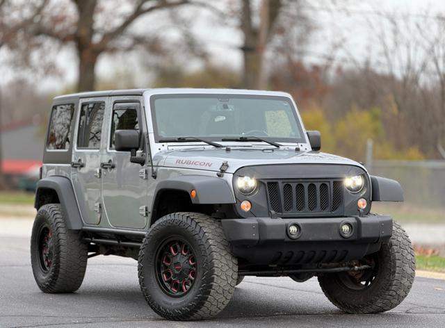 used 2014 Jeep Wrangler Unlimited car, priced at $12,995