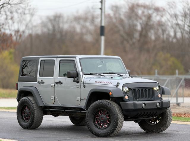 used 2014 Jeep Wrangler Unlimited car, priced at $12,995