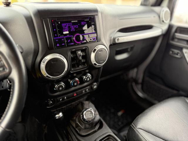 used 2014 Jeep Wrangler Unlimited car, priced at $12,995