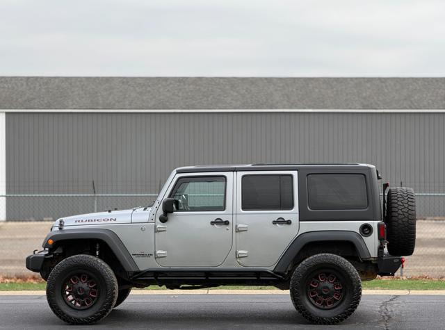 used 2014 Jeep Wrangler Unlimited car, priced at $12,995