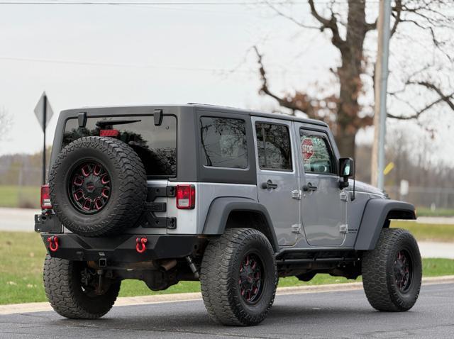 used 2014 Jeep Wrangler Unlimited car, priced at $12,995