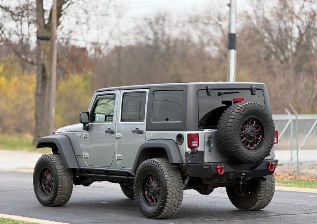 used 2014 Jeep Wrangler Unlimited car, priced at $12,995