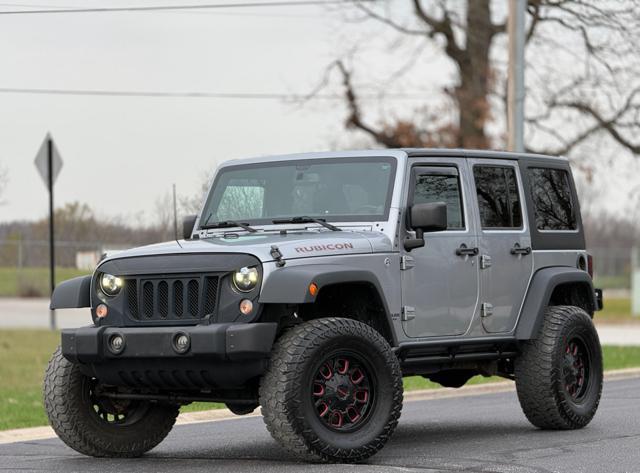 used 2014 Jeep Wrangler Unlimited car, priced at $12,995