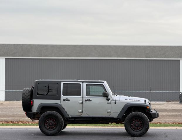 used 2014 Jeep Wrangler Unlimited car, priced at $12,995