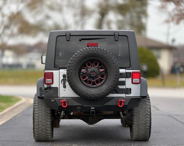 used 2014 Jeep Wrangler Unlimited car, priced at $12,995