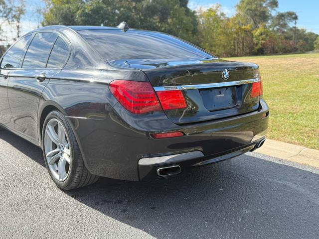 used 2010 BMW 750 car, priced at $6,995
