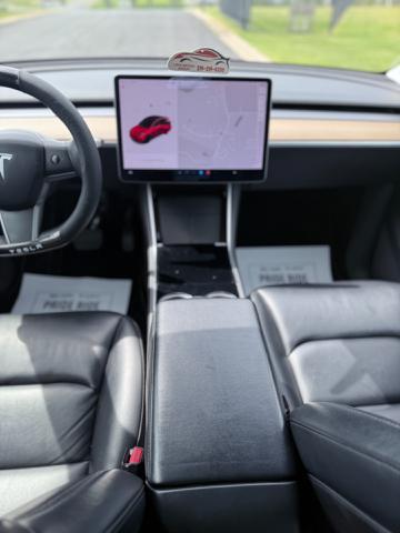 used 2021 Tesla Model Y car, priced at $14,995