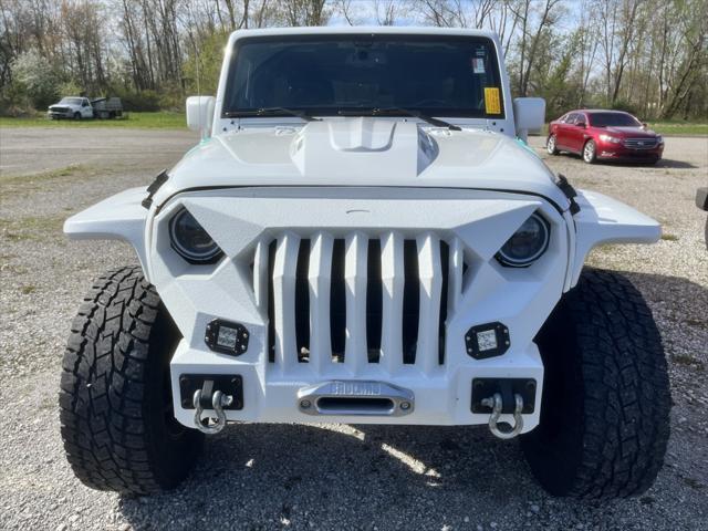 used 2013 Jeep Wrangler Unlimited car, priced at $24,991