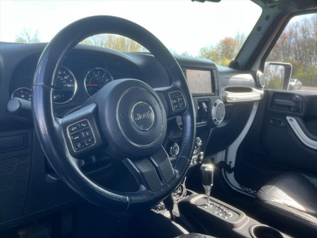used 2013 Jeep Wrangler Unlimited car, priced at $24,991