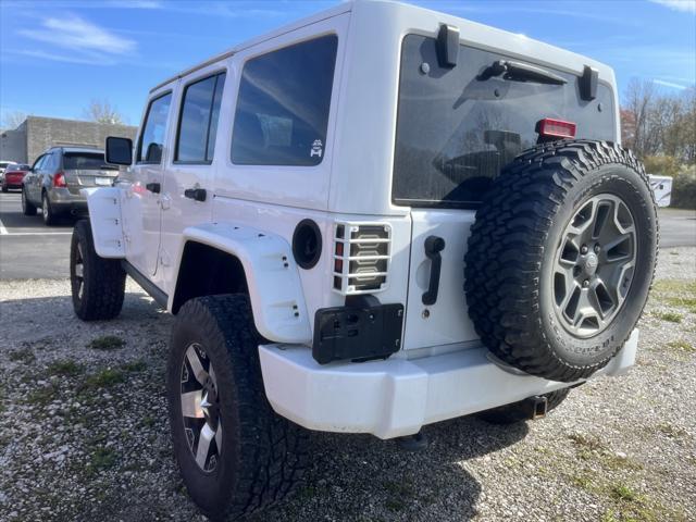 used 2013 Jeep Wrangler Unlimited car, priced at $24,991