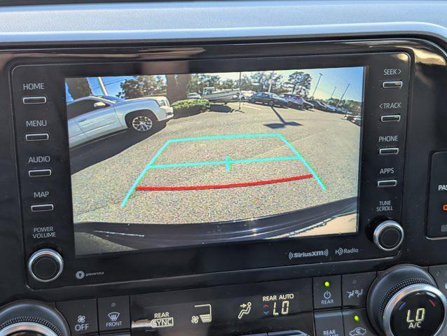 used 2022 Toyota Highlander Hybrid car, priced at $25,307