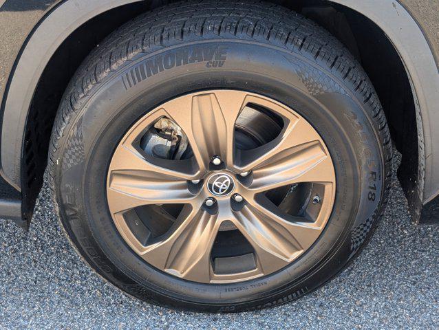 used 2022 Toyota Highlander Hybrid car, priced at $25,307