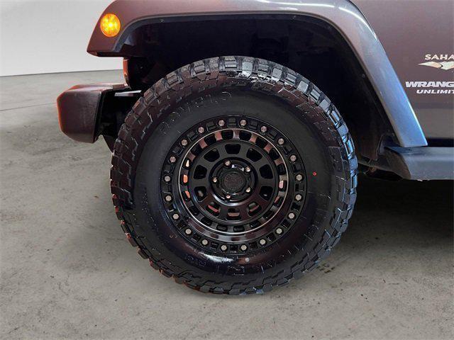 used 2014 Jeep Wrangler Unlimited car, priced at $15,950