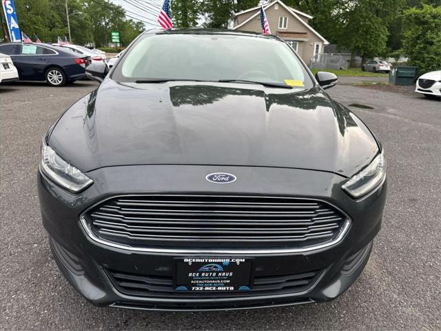 used 2015 Ford Fusion car, priced at $7,995