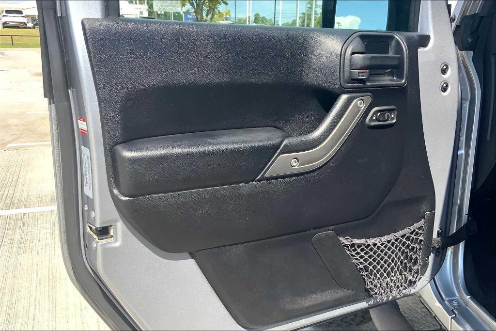 used 2016 Jeep Wrangler Unlimited car, priced at $16,491