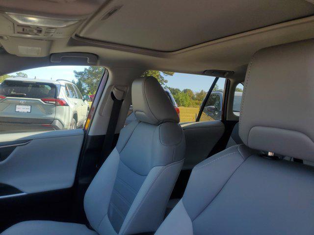 used 2021 Toyota RAV4 Hybrid car, priced at $29,095