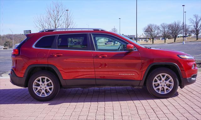 used 2015 Jeep Cherokee car, priced at $11,391