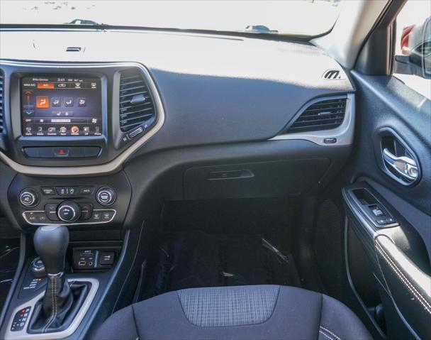 used 2015 Jeep Cherokee car, priced at $11,391