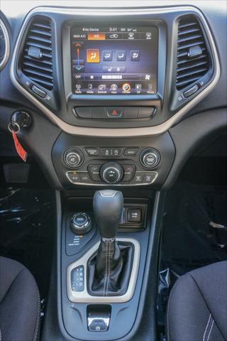 used 2015 Jeep Cherokee car, priced at $11,391