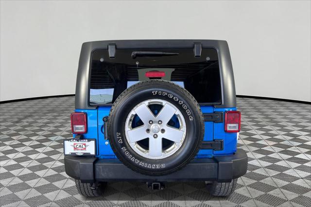 used 2015 Jeep Wrangler Unlimited car, priced at $16,995