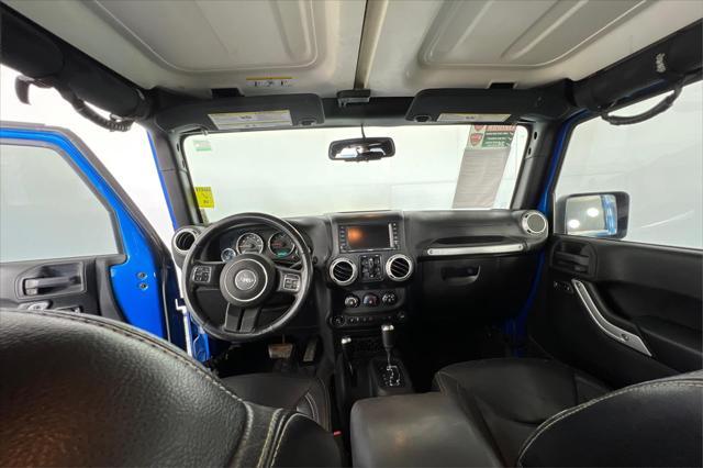 used 2015 Jeep Wrangler Unlimited car, priced at $16,995