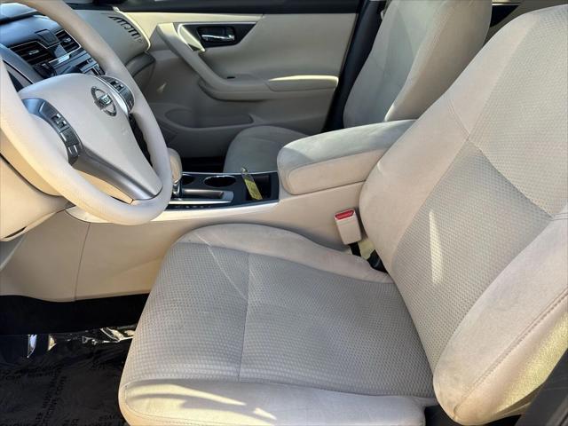 used 2015 Nissan Altima car, priced at $10,000