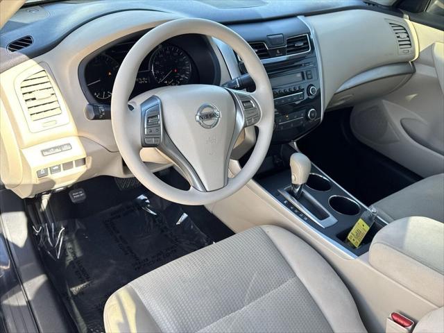 used 2015 Nissan Altima car, priced at $10,000