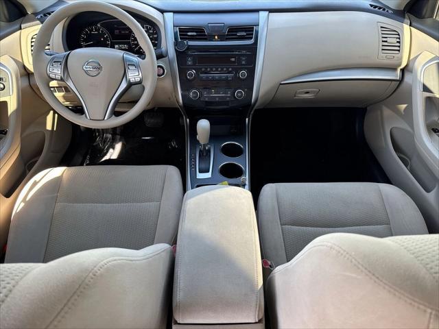 used 2015 Nissan Altima car, priced at $10,000