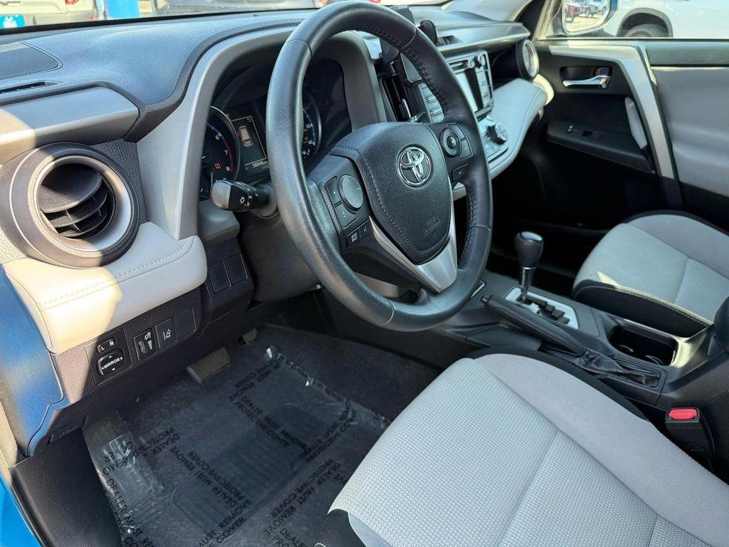 used 2018 Toyota RAV4 car, priced at $19,400