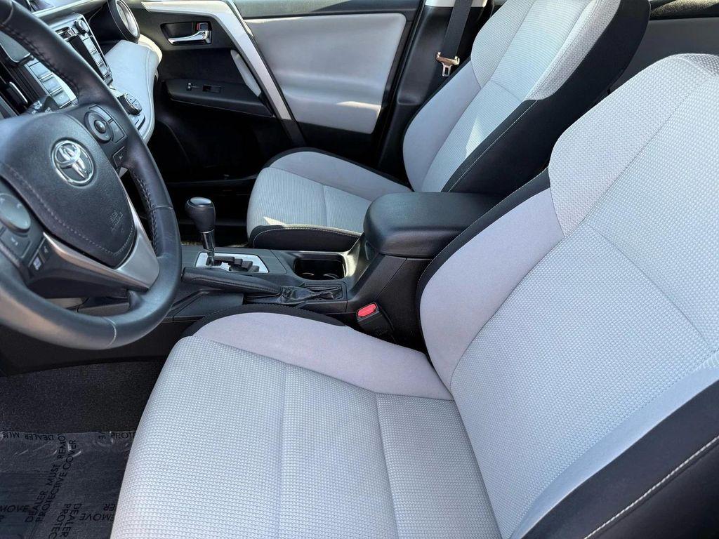 used 2018 Toyota RAV4 car, priced at $19,400