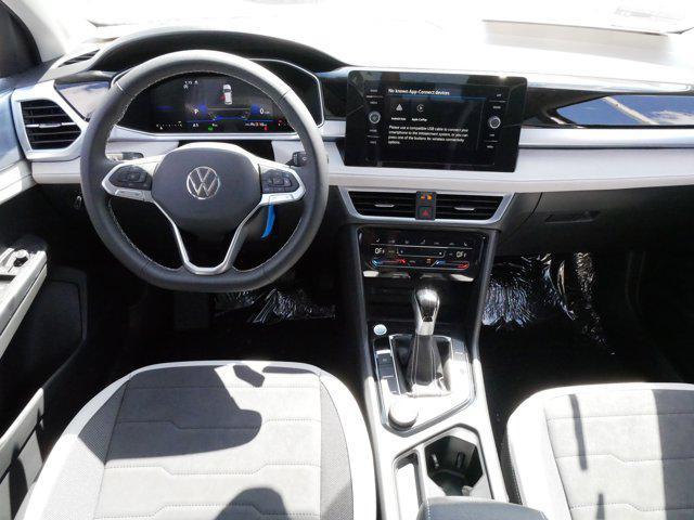 new 2025 Volkswagen Taos car, priced at $33,216