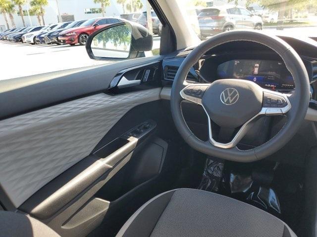 used 2023 Volkswagen Taos car, priced at $23,495