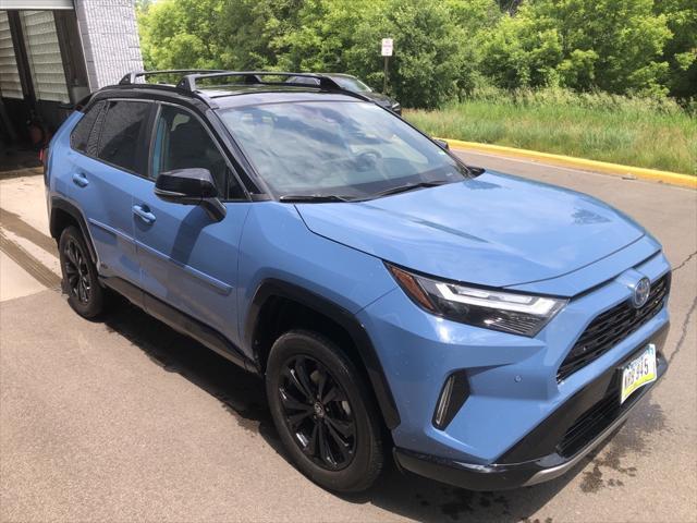 used 2023 Toyota RAV4 Hybrid car, priced at $40,000