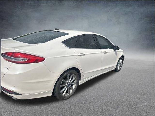 used 2017 Ford Fusion car, priced at $5,000