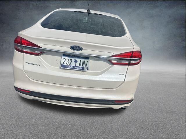 used 2017 Ford Fusion car, priced at $5,000