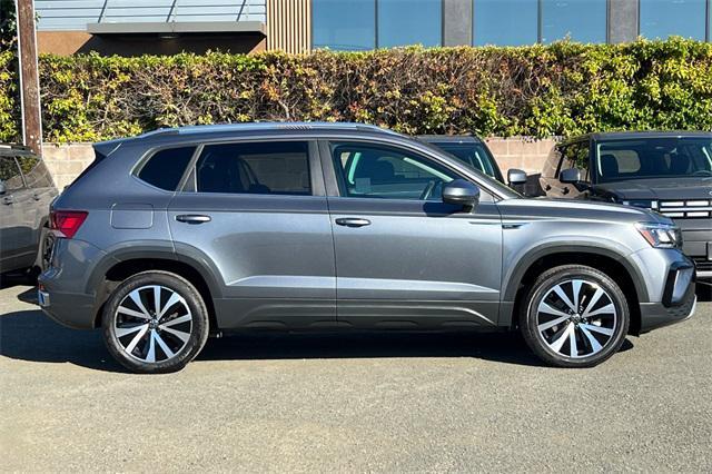 used 2024 Volkswagen Taos car, priced at $19,590