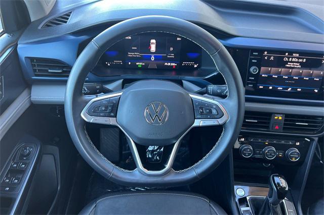 used 2024 Volkswagen Taos car, priced at $19,590