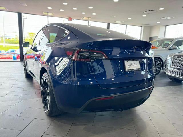 used 2021 Tesla Model Y car, priced at $28,995