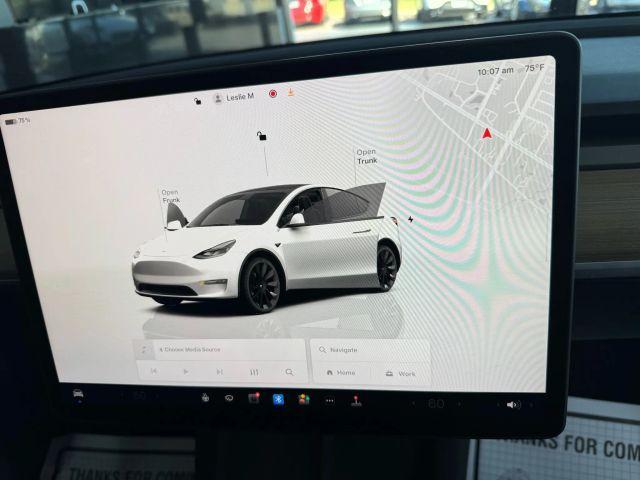 used 2024 Tesla Model Y car, priced at $33,995