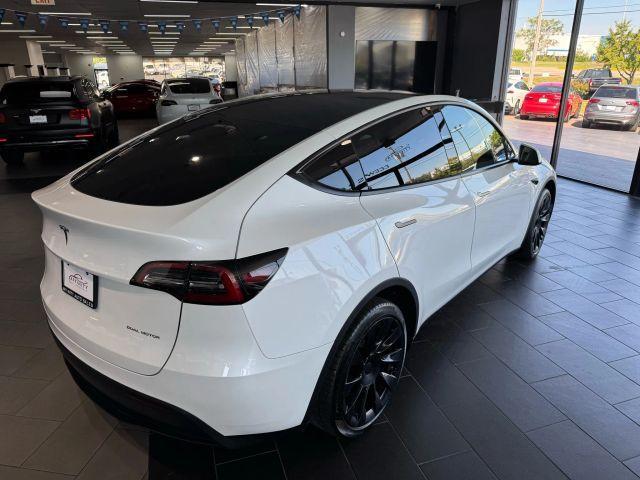 used 2024 Tesla Model Y car, priced at $33,995