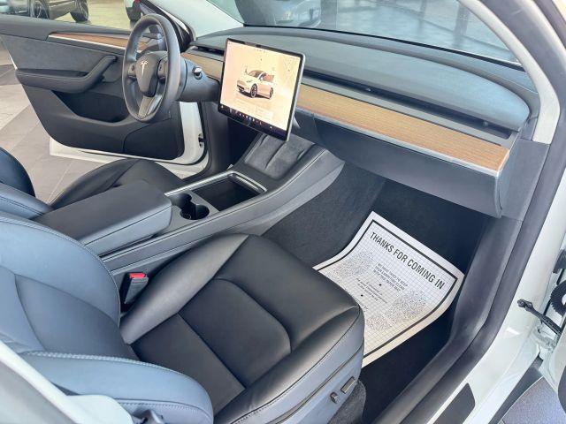 used 2024 Tesla Model Y car, priced at $33,995